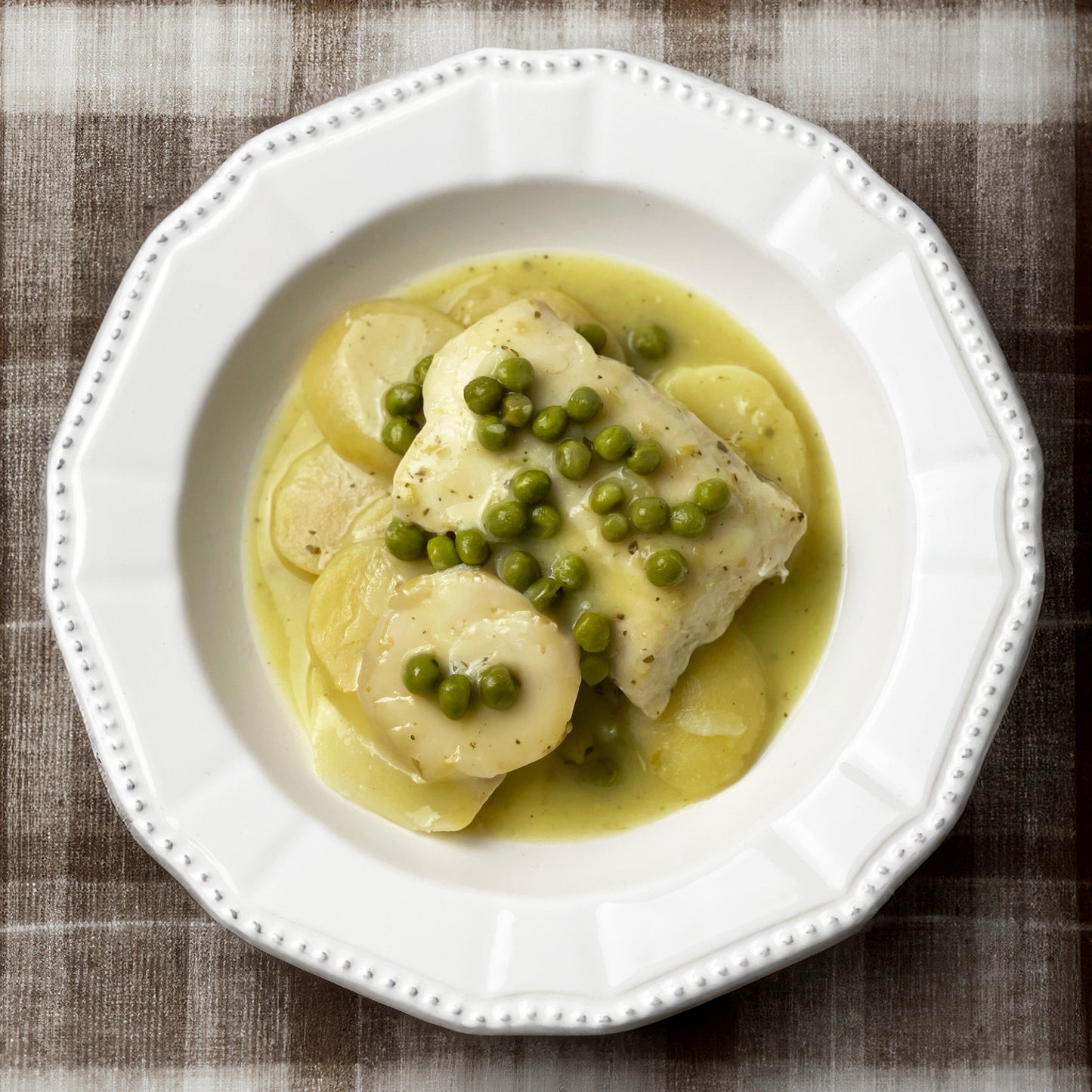 Merluza en salsa verde con patatas