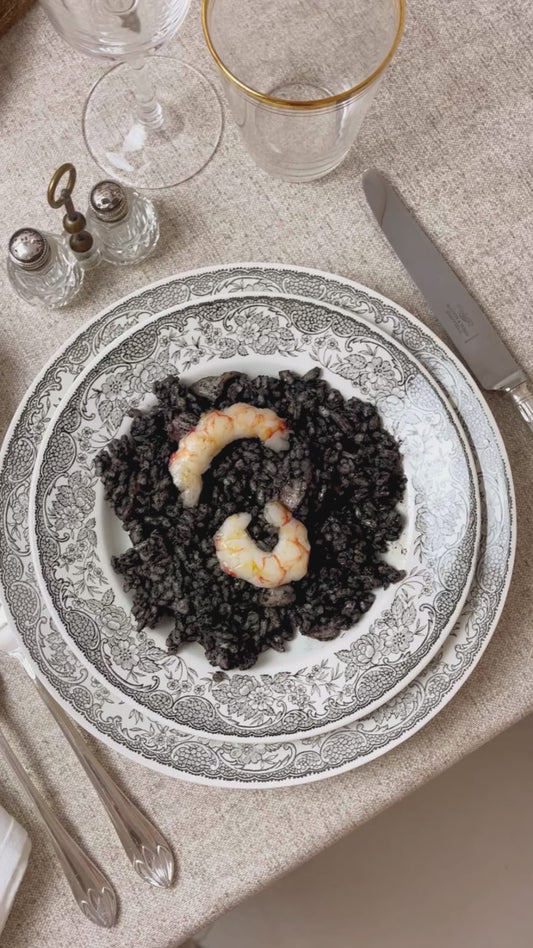 Arroz Negro con calamares y gambones